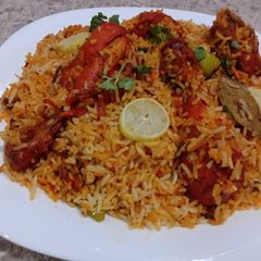 A picture of Bbq Chicken tikka baryani.