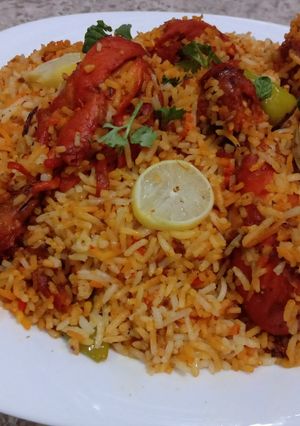 A picture of Bbq Chicken tikka baryani.