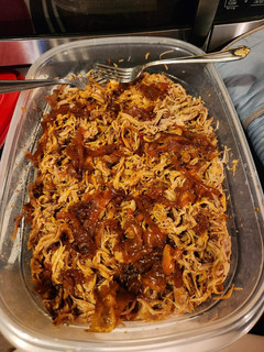 A picture of SPICY Pulled Pork 😋 in Dutch oven.