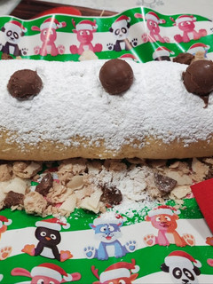 Una foto de Pionono nevado con dulce de leche
