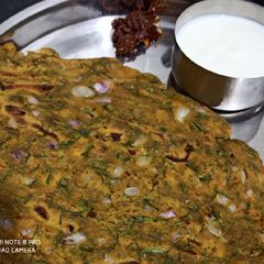 A picture of Bajra and dill leaves thalipeeth.