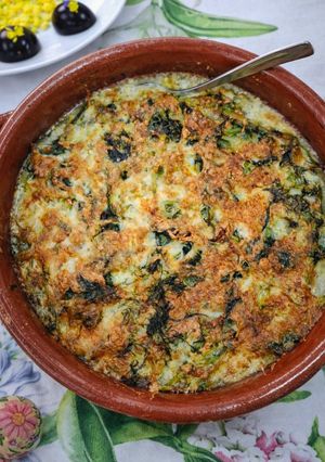 Foto di Timballo di Cardoncelli, Finocchietti e Agnello in Coccio di Terracotta Pasquale
