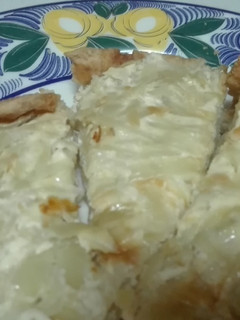 Una foto de Quiche de cebolla