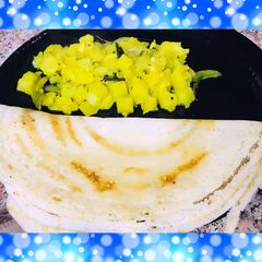 A picture of Schezwan spread butter dosa.