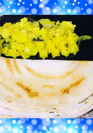 A picture of Schezwan spread butter dosa.