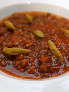 Una foto de Lentejas estofadas con picadillo de carne al comino