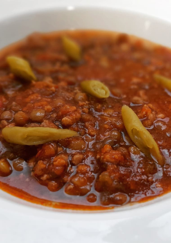 Una foto de Lentejas estofadas con picadillo de carne al comino