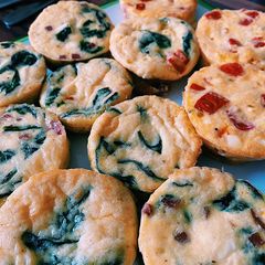 A picture of Mini frittatas with spinach and bacon 🥓.
