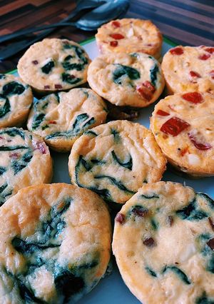 A picture of Mini frittatas with spinach and bacon 🥓.