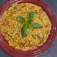 A picture of Spanish Saffron Risotto with Zucchini and Sundried Tomatoes.