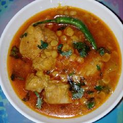 A picture of Chicken with dal chana.