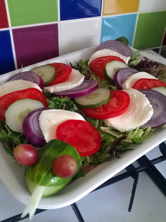A picture of Vickys Halloween Cucumber 'Caprese' Snake Salad, GF DF EF SF NF.