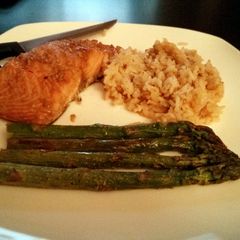 A picture of Steamed Salmon with Garlic Rice.