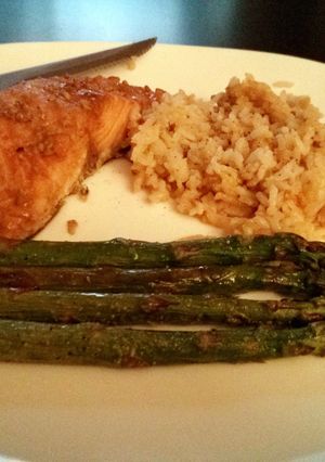 A picture of Steamed Salmon with Garlic Rice.