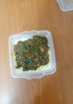 A picture of White rice with stew vegetable.