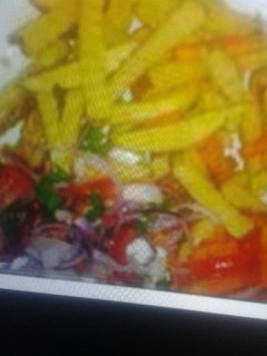 A picture of Chips with kachumbari.