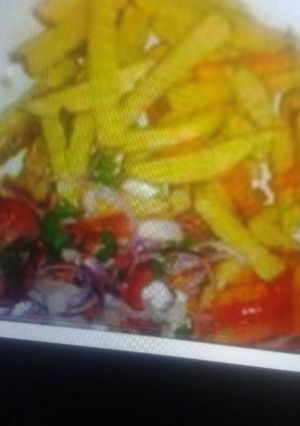 A picture of Chips with kachumbari.
