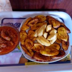 A picture of Fried plantain/Sweet potatoe with Stew.