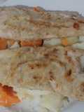 Lomitos de Merluza a la plancha, sobre colchón de papas y boniatos