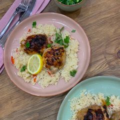 A picture of Sticky chicken and pilau rice.