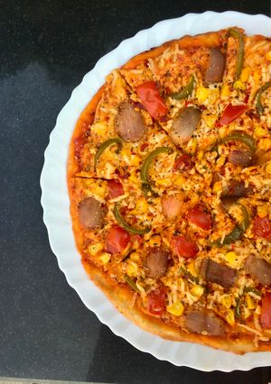 A picture of Thin crust veggie pizza.