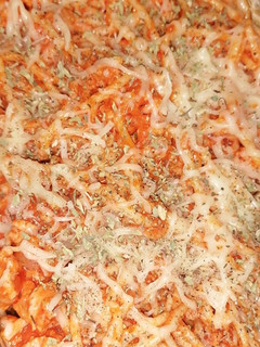 Una foto de Spaguettis gratinados con orégano y pimienta