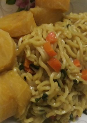 A picture of Indomine with carrots and boiled plantain.
