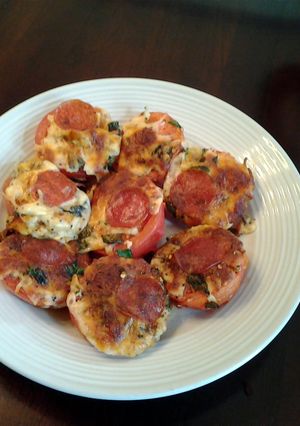 A picture of Pizza Baked Tomatos.
