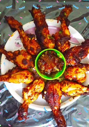 A picture of Chicken Drumsticks in Schezwan Sauce.