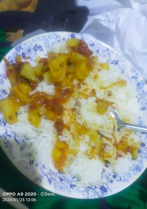 A picture of White Rice with Potato Salan.