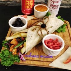 A picture of Fajita chicken wraps.