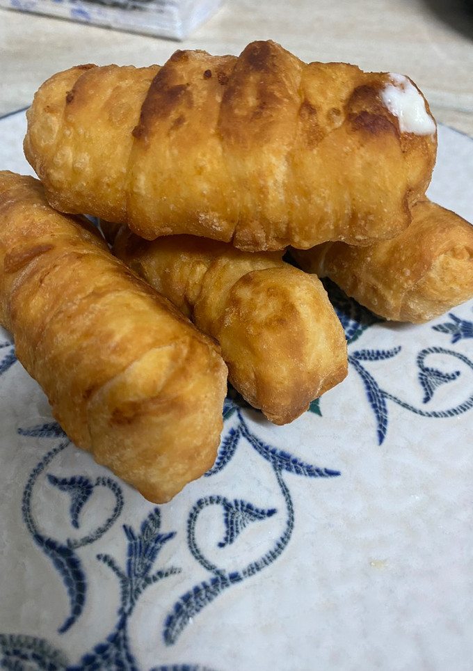 Una foto de Tequeños o palitos de queso