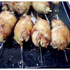 A picture of Stuffed chicken with ham.