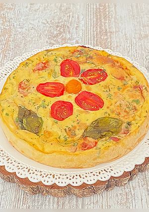 Une photo de Quiche sans pâte au jambon/tomates cerises