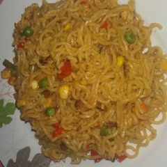 A picture of Noodles Jollof.