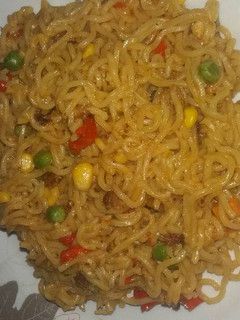 A picture of Noodles Jollof.