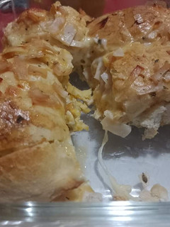 Una foto de Pan gratinado con Jamón y queso
