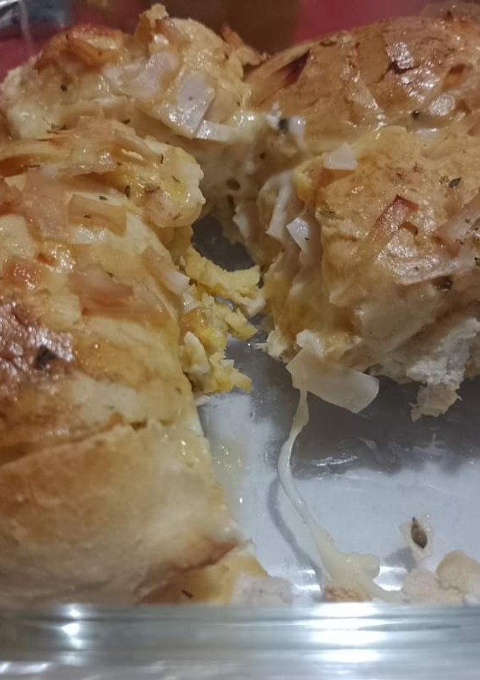 Una foto de Pan gratinado con Jamón y queso