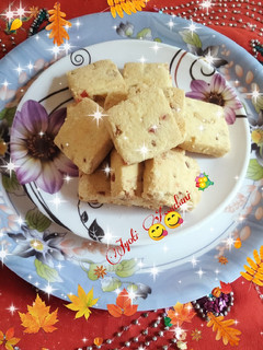 A picture of Eggless bakery biscuit with tutti frutti nuts.