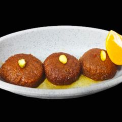 A picture of Orange Bread balls.