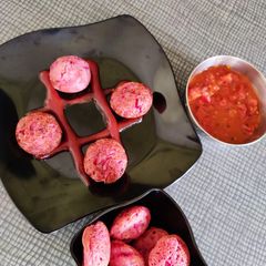 A picture of Suji Beetroot Paniyaram.
