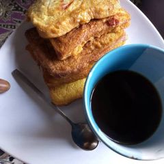 A picture of Fried bread in egg.