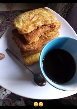 A picture of Fried bread in egg.