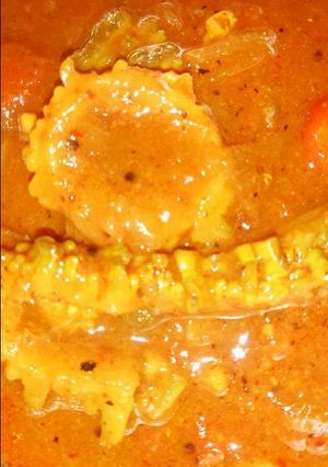 A picture of Pandu Kaakarakaaya pulusu (bittergourd curry).