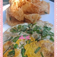 A picture of Green Garlic Egg With paratha.
