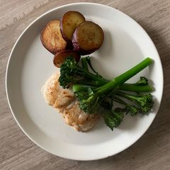Hake, sweet potato chips and broccoli A picture of Hake, sweet potato chips and broccoli.