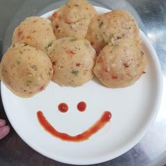 A picture of Idli with loded vegiee.