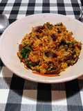 Cous-cous con champiñones y verduras salteados en wok