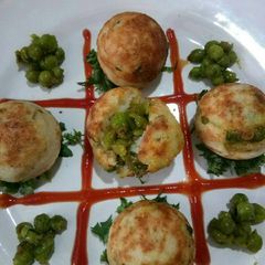 A picture of Green Pea Stuff Appam.