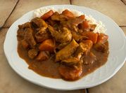 Una foto de pechugas de pollo adobadas